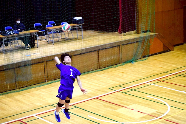 写真：円陣を組む選手たち